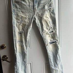 Men's Distressed Light Blue Jeans
